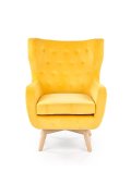 Fotel do salonu, klasyczny, tradycyjny, typu uszak, żółta tapicerka, nóżki drewniane, oparcie pikowane