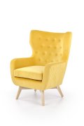 Fotel do salonu, klasyczny, tradycyjny, typu uszak, żółta tapicerka, nóżki drewniane, oparcie pikowane