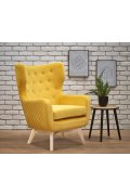 Fotel do salonu, klasyczny, tradycyjny, typu uszak, żółta tapicerka, nóżki drewniane, oparcie pikowane