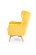 Fotel do salonu, klasyczny, tradycyjny, typu uszak, żółta tapicerka, nóżki drewniane, oparcie pikowane