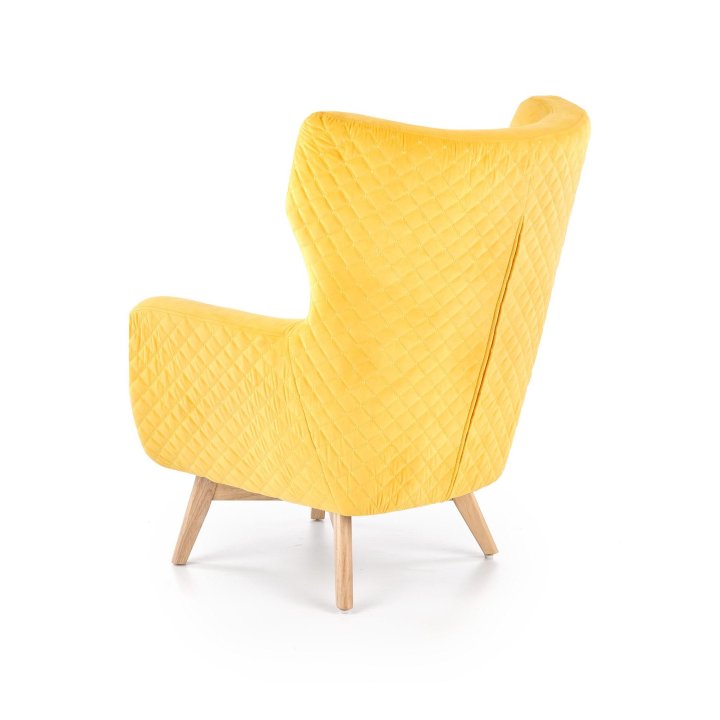 Fotel do salonu, klasyczny, tradycyjny, typu uszak, żółta tapicerka, nóżki drewniane, oparcie pikowane