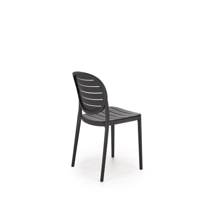 Czarne krzesło do kuchni z plastikowym okrągłym oparciem i eleganckim designem