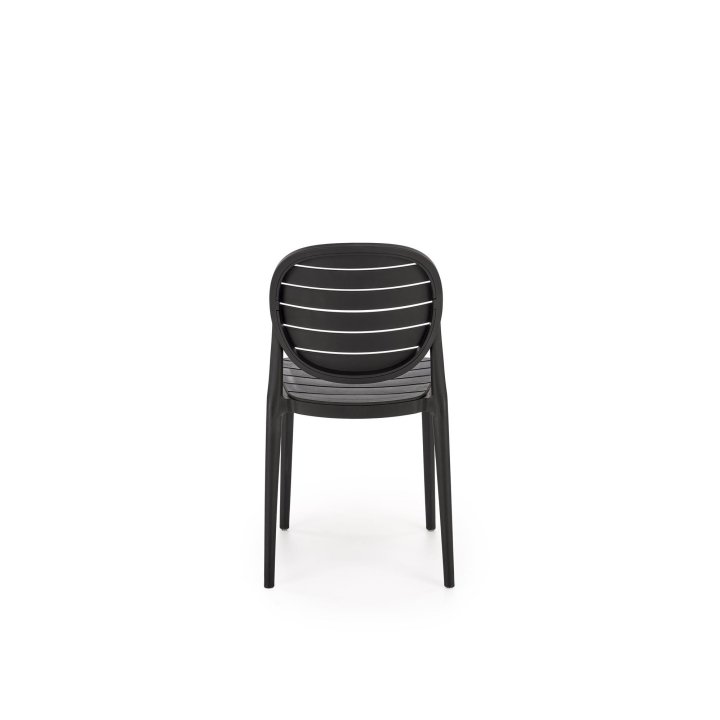 Czarne krzesło do kuchni z plastikowym okrągłym oparciem i eleganckim designem