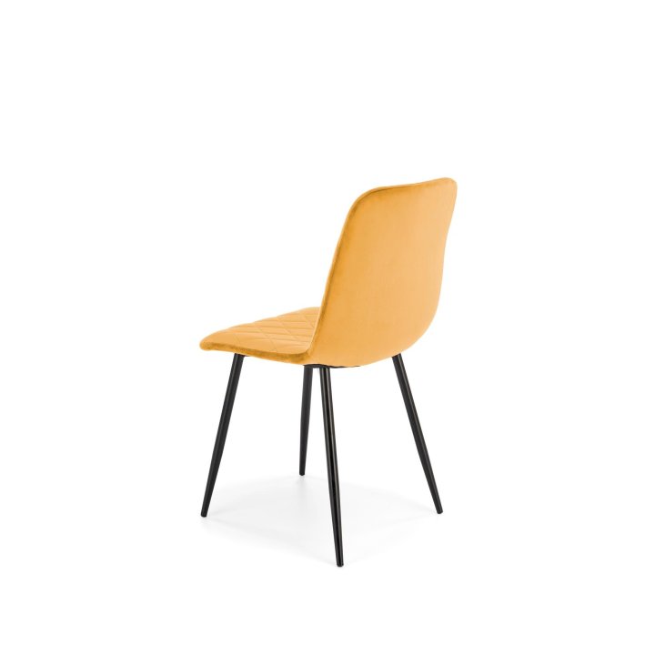 Musztardowe tapicerowane krzesło do jadalni z czarnymi nogami