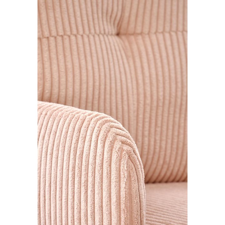 Miękki i wygodny nowoczesny fotel z jasną różową tapicerką na jasnej obrotowej podstawie